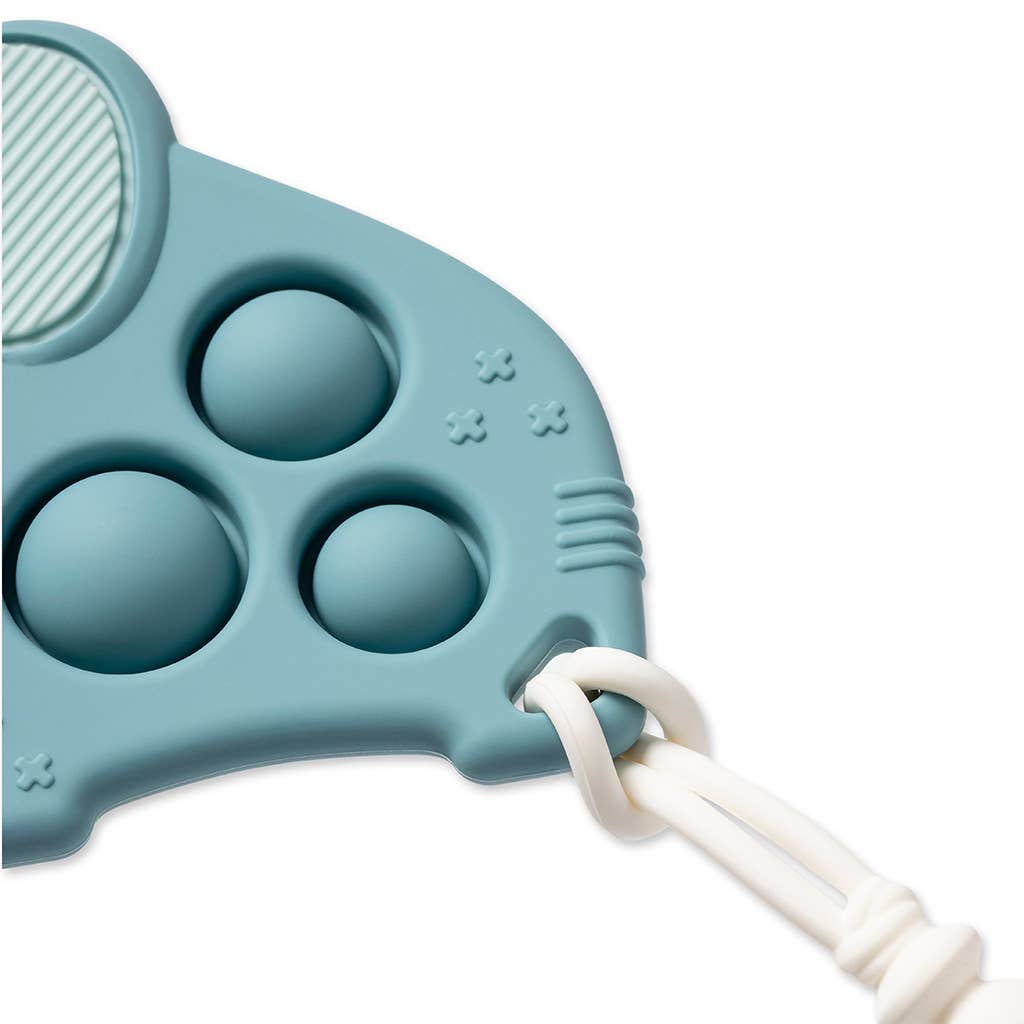 Eco-friendly Itzy Ritzy Itzy Pop™ Elephant Sensory Toy in Blue for soothing teething relief and sensory play.