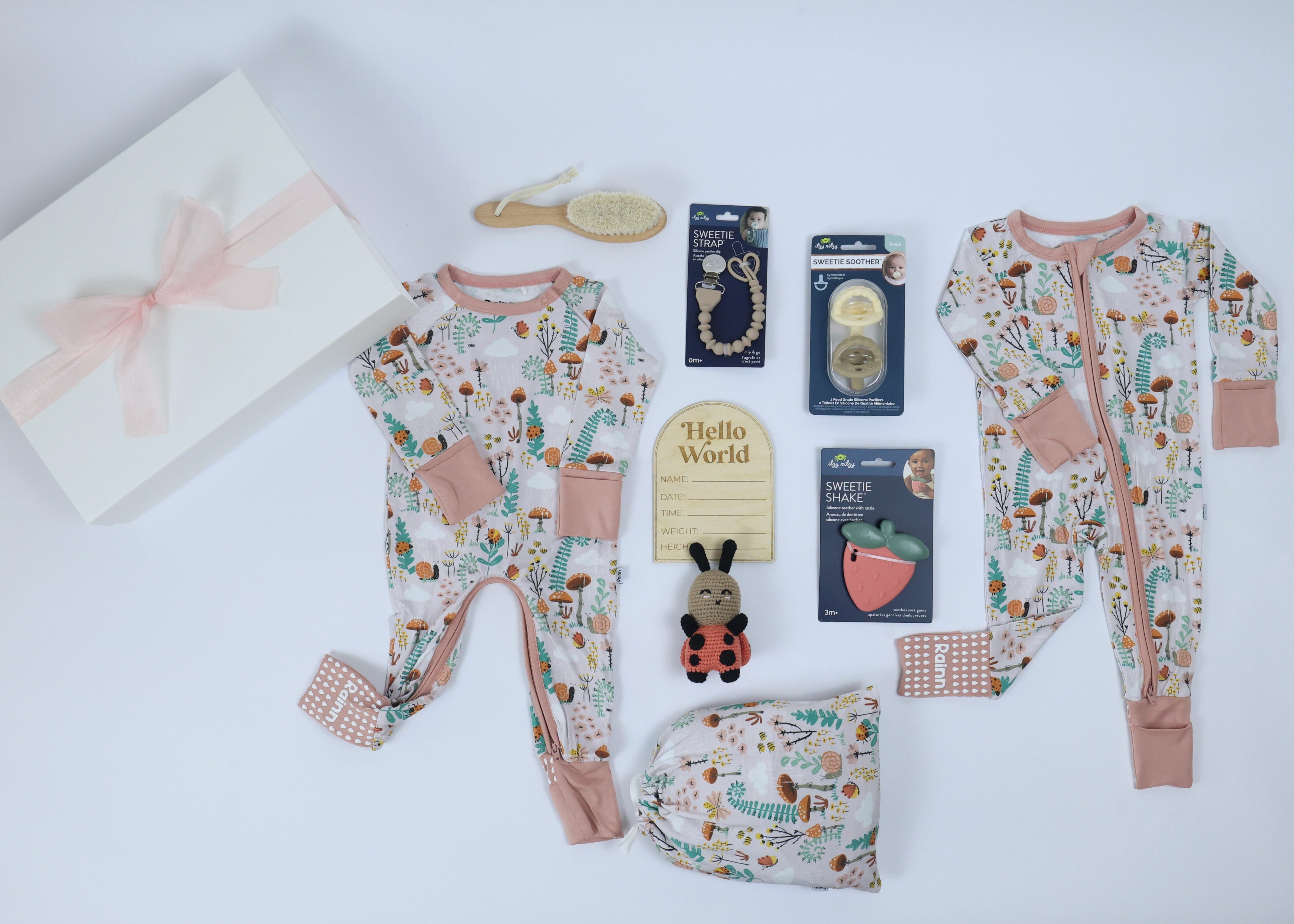 Baby Gift Set for Girls - Sleep & Play Fern with bamboo fabric essentials, including pajamas, toys, and accessories for snuggly days and nights.