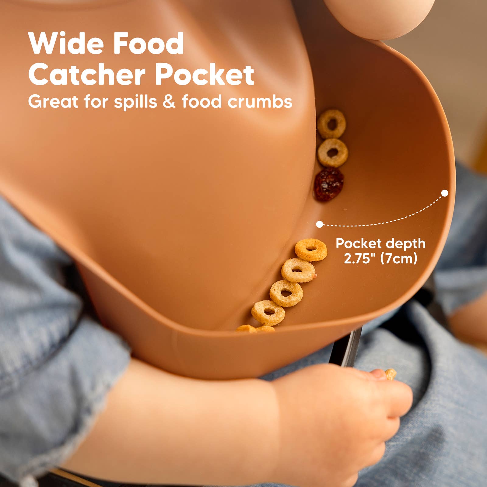 Silicone Bibs for babies with wide food catcher pocket on KeaBabies Prep bib, holding cereal. BPA-free, food-grade silicone material.