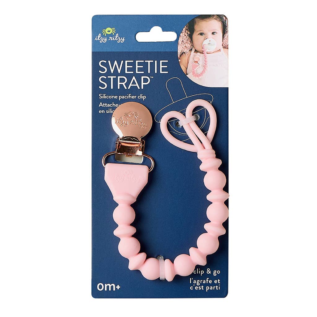Sweetie Strap™ silicone pacifier clip in pink with stylish beads and secure clasp for toddlers.