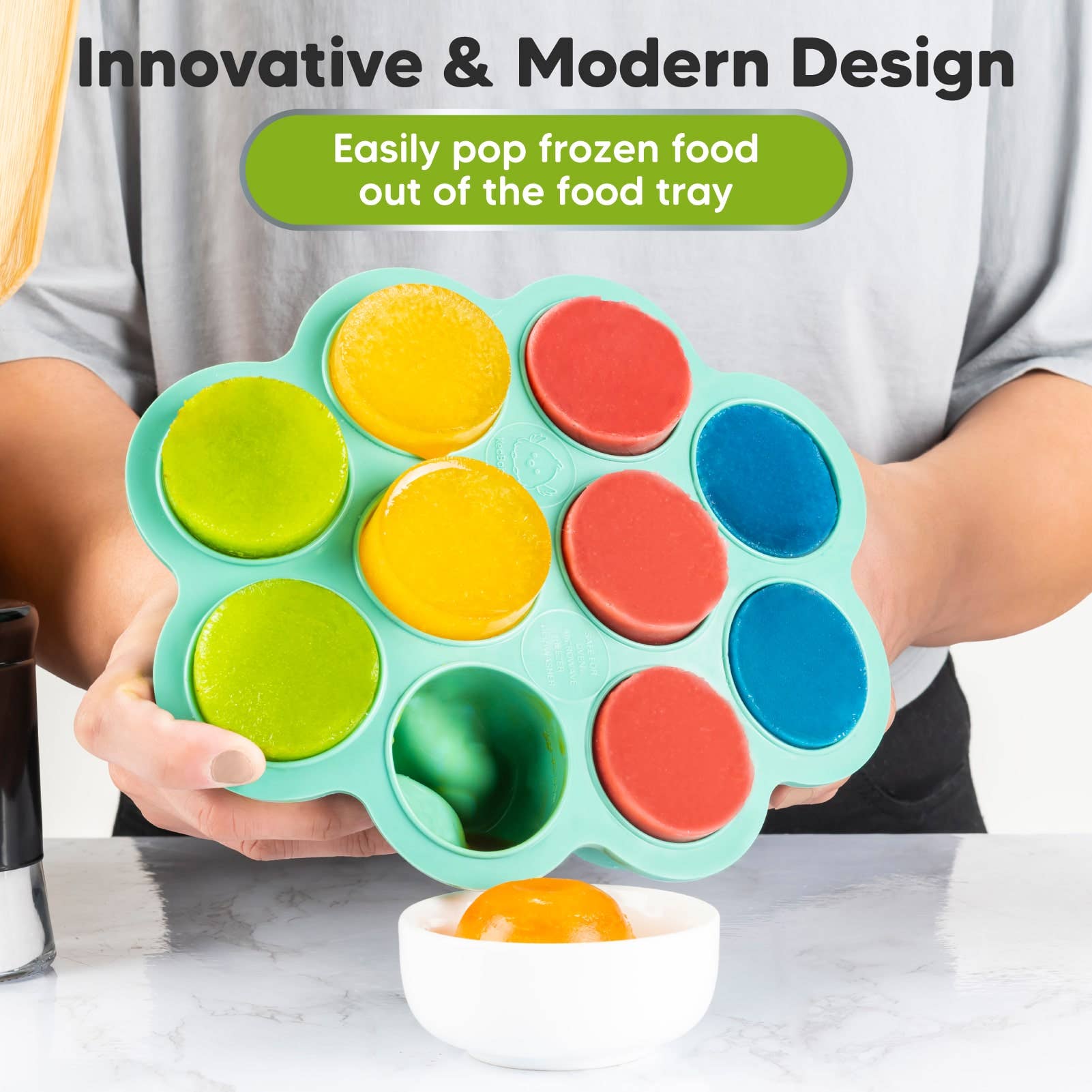 Innovative silicone baby food freezer tray with colorful pods, easily releasing frozen food for mealtime.