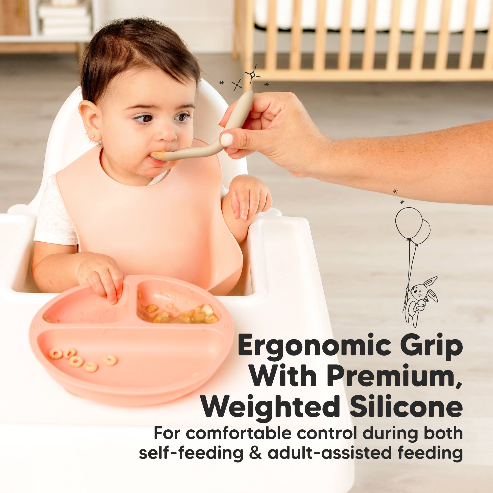 Toddler using Silicone Baby Spoon for self-feeding at high chair