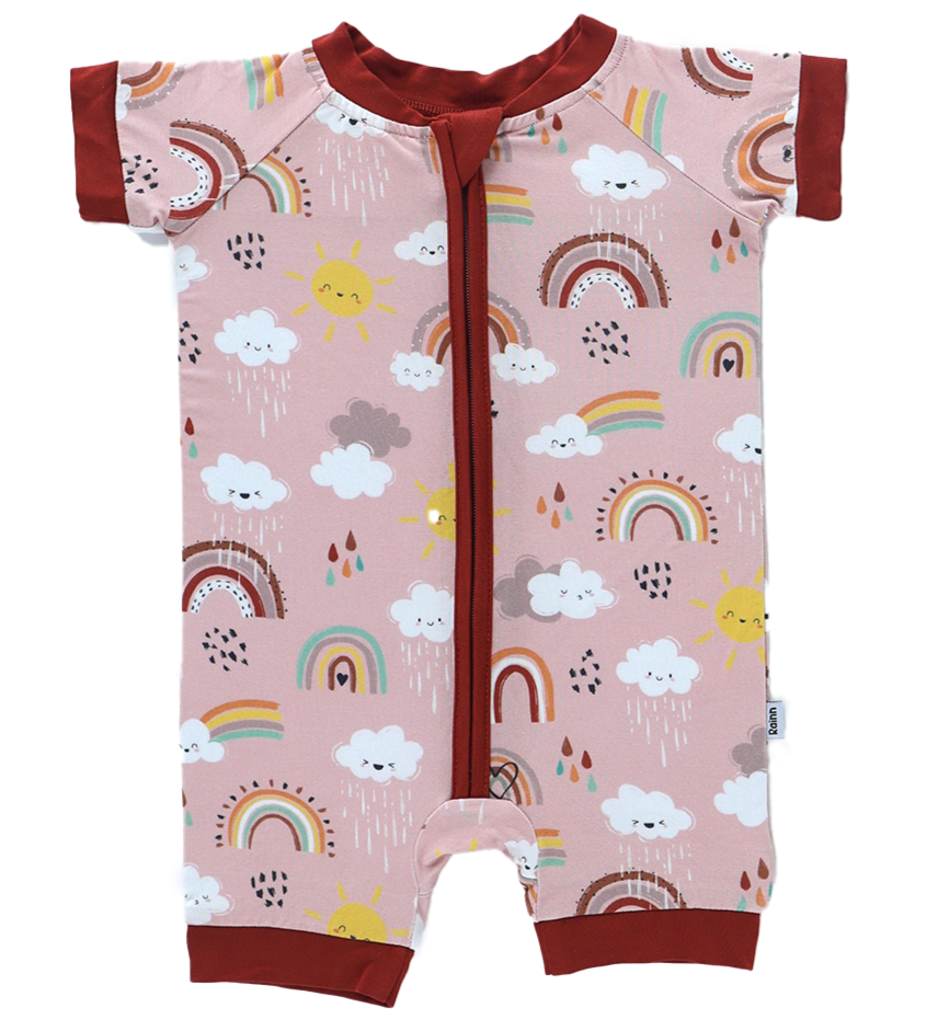 Bamboo Short Romper with rainbows and clouds pattern by Rainn, perfect for baby comfort with breathable, hypoallergenic fabric.